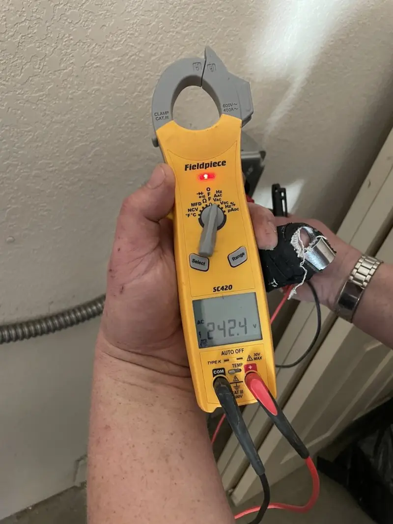 Voltage testing with clamp meter during Generator Installation in Yountville